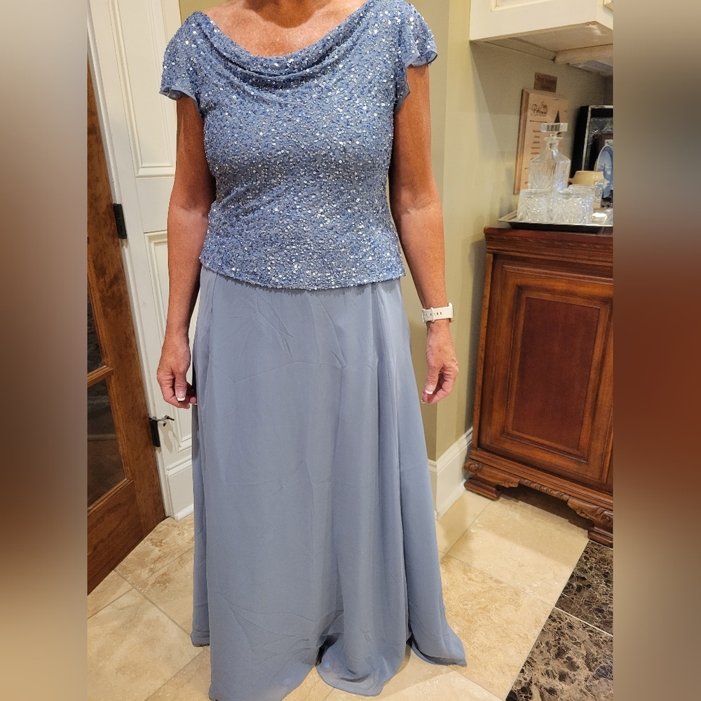 Dusty Blue size 8 evening gown. Sequin on top with chiffon skirt.  Floor length